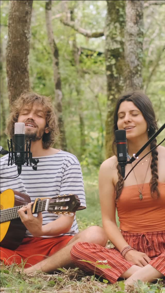 Ana and Arthur singing together in the forest